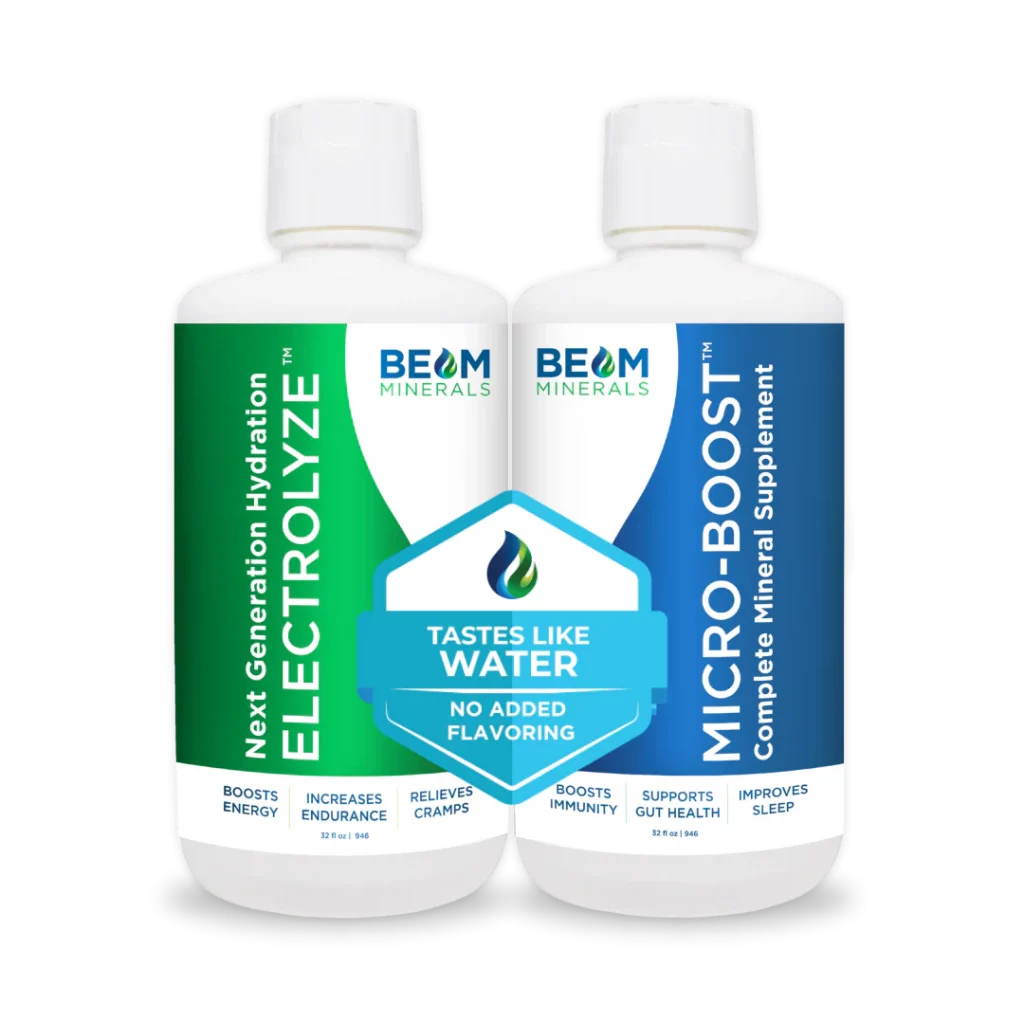 Two bottles of Beam Minerals supplements, labeled 'ELECTROLYZE' and 'MICRO-BOOST', featuring green and blue designs with health claims and usage instructions.